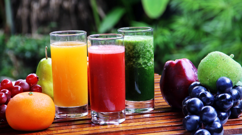 varieties of juices on a wood table