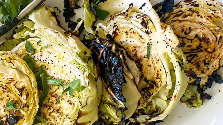 serving grilled cabbage steaks