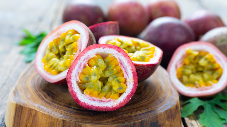 passion fruit on a wood cutting board