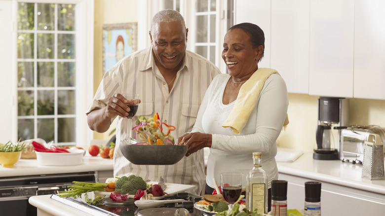 couple fixing a healthy dinner