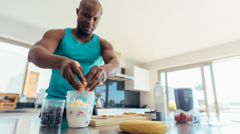 Individual making a milk shake