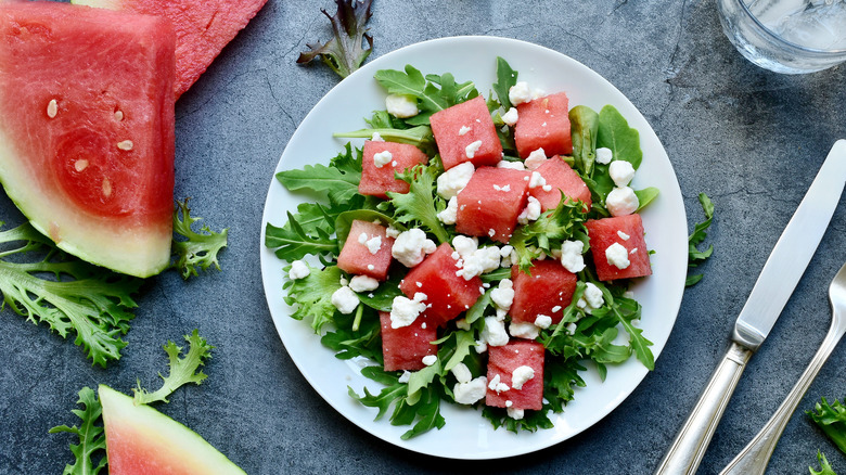 watermelon salad with feta cheese and greens