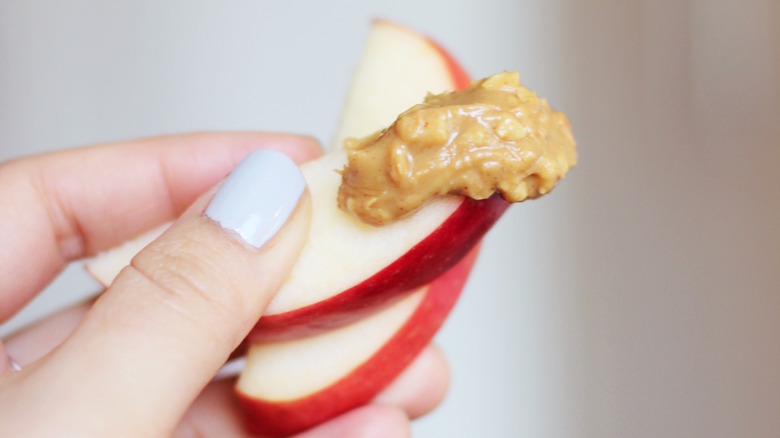 Peanut butter on apple