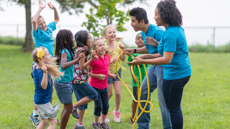 Kids doing teamwork activities at summer camp