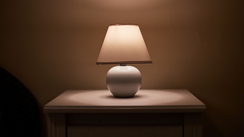 a lamp in a bedroom