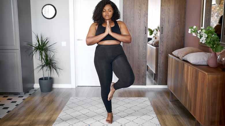 Woman exercising at home