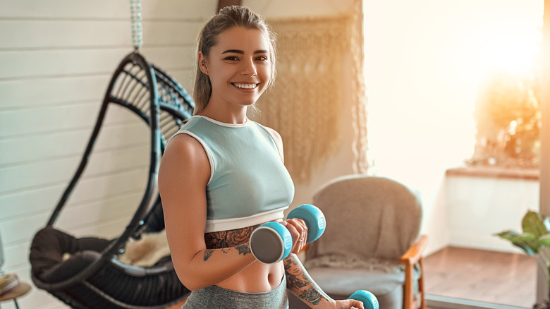 Woman performing bicep curls