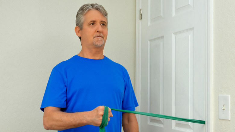 Man using resistance bands