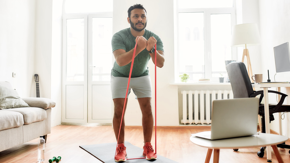 man using resistance band