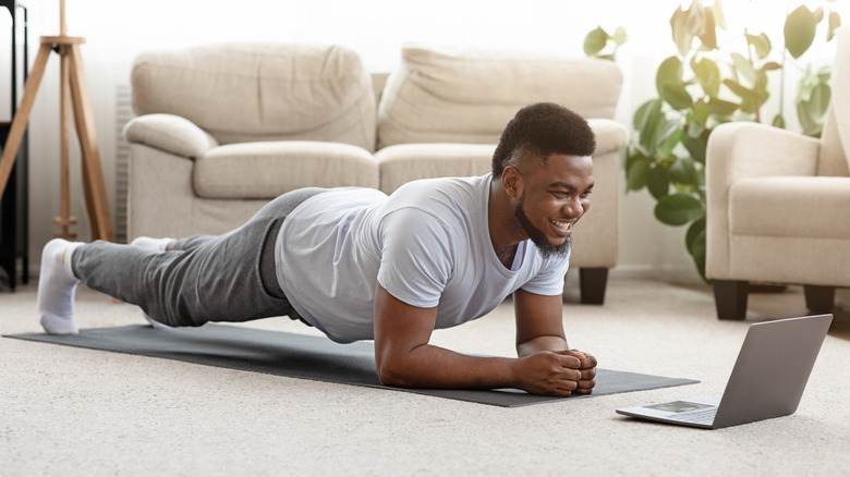 man doing plank pose