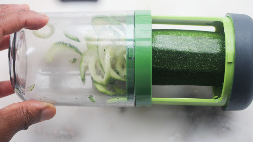 prepping veggies in spiralizer
