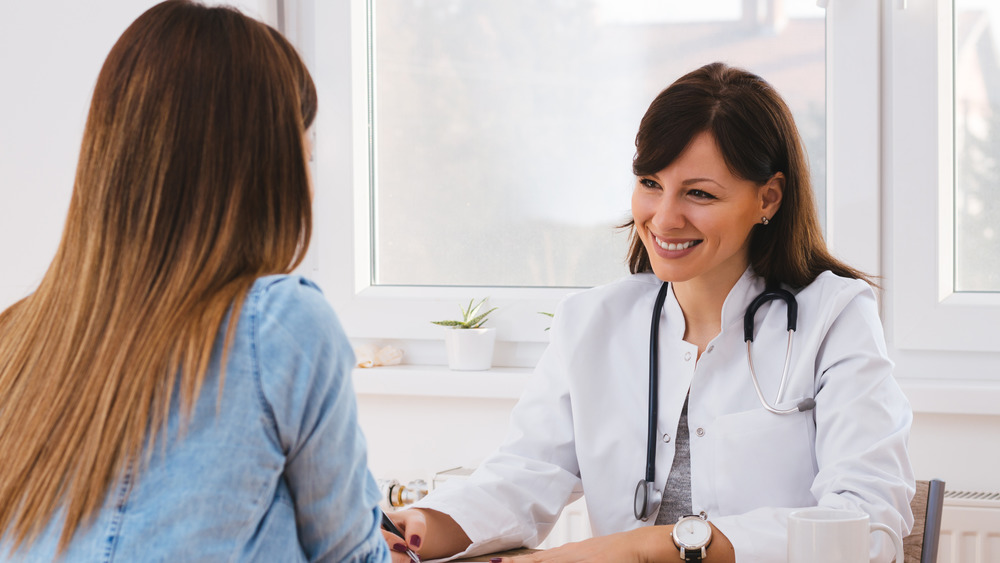 woman visiting doctor