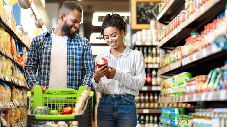 a couple buying organic food