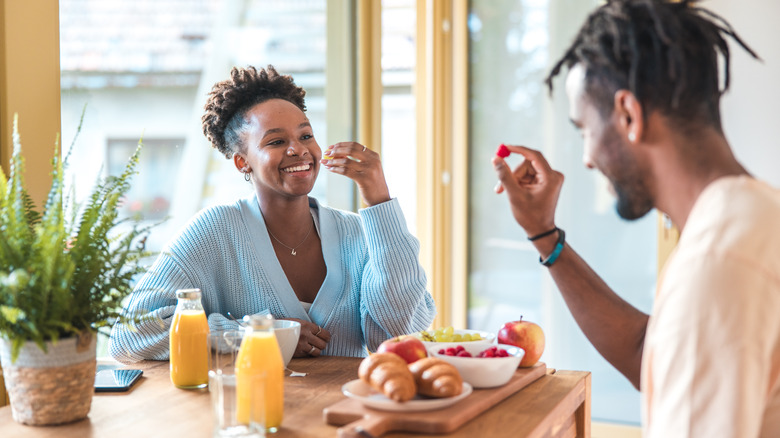 couple enjoying a healthy breakfast