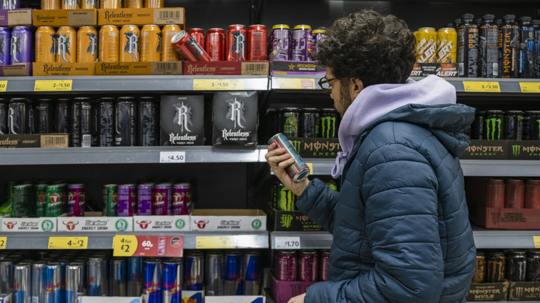 Man shopping for energy drink