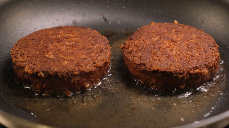 Beyond Burgers cooking in frying pan