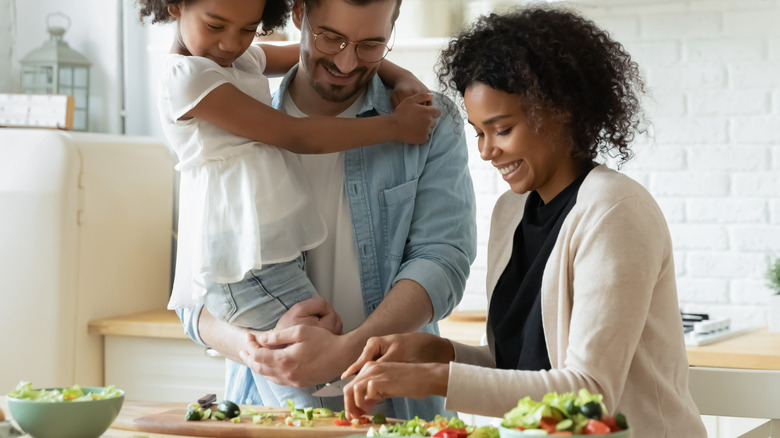 Family preparing a vegetarian meal