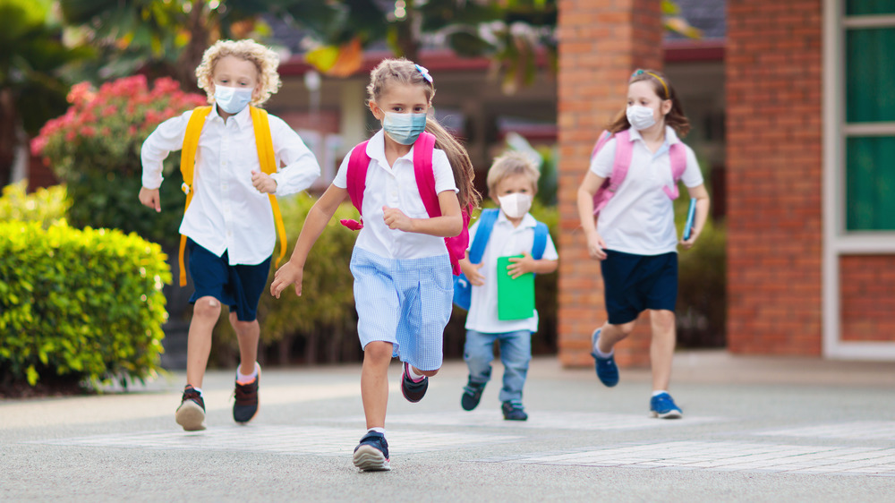 Children at school wearing masks