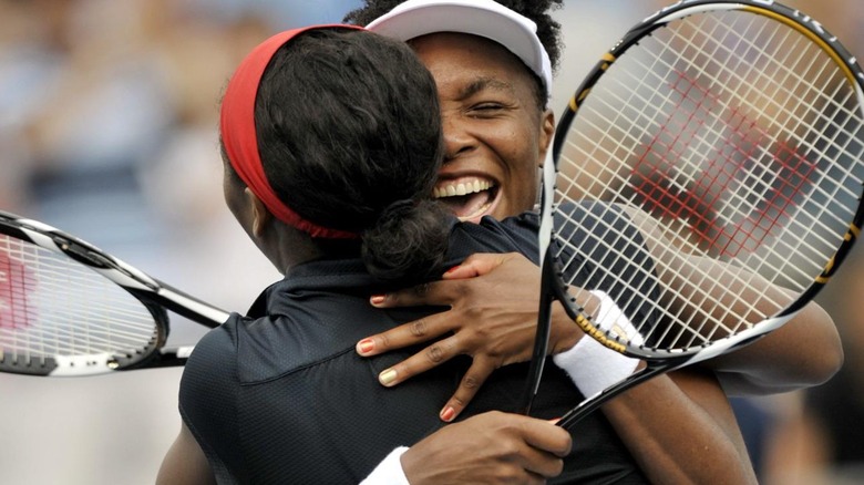 Serena and Venus Williams hugging
