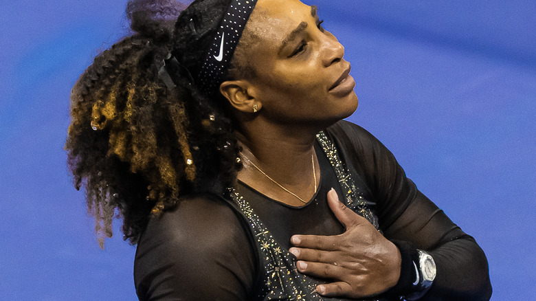 Serena Williams with hand on chest