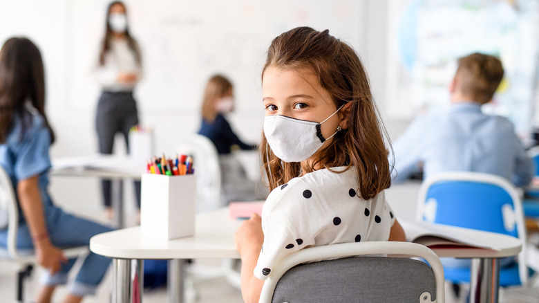 masked school girl