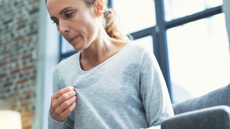 Woman experiencing a hot flash