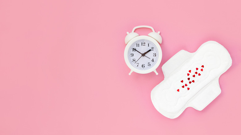 Menstrual pad with alarm clock 