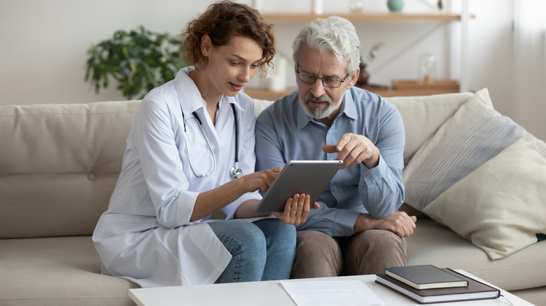 man talking with doctor