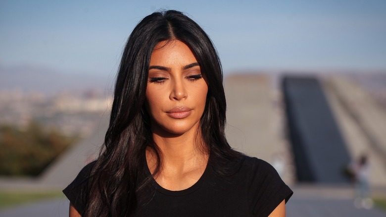  Kim Kardashian in black shirt 