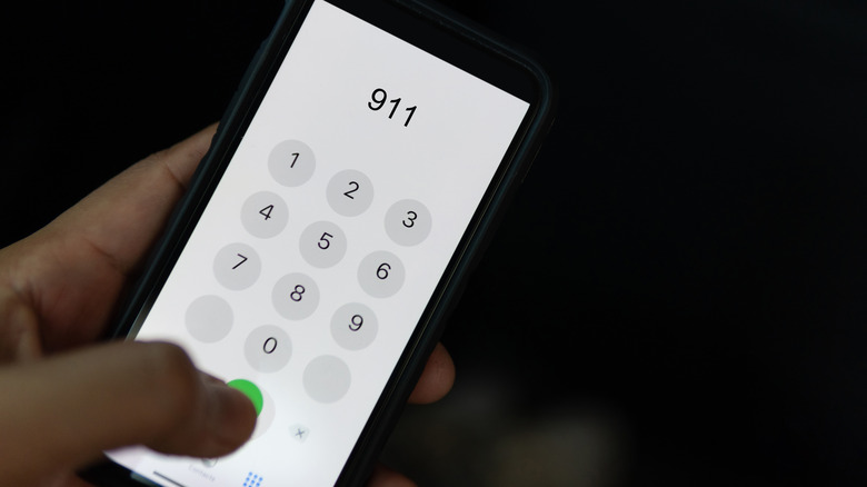 Hand dialing 911 