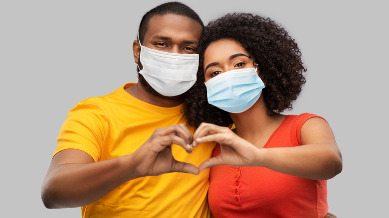 couple wearing masks