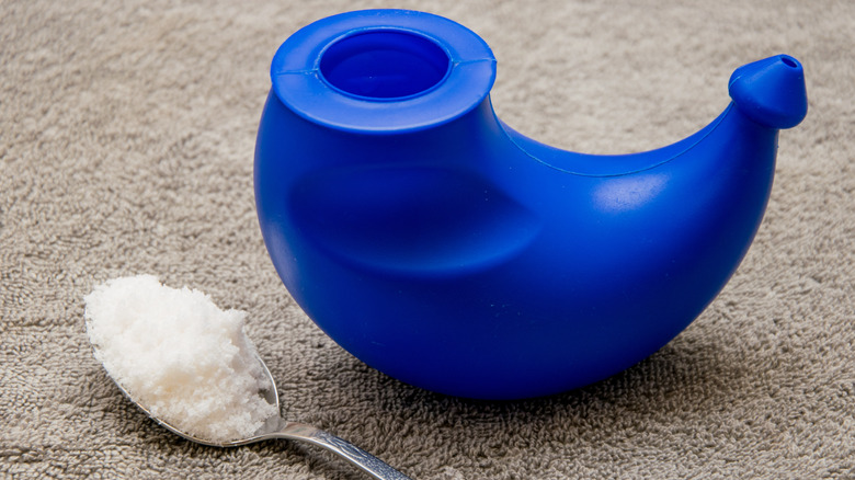 Neti pot and salt for washing the nose.