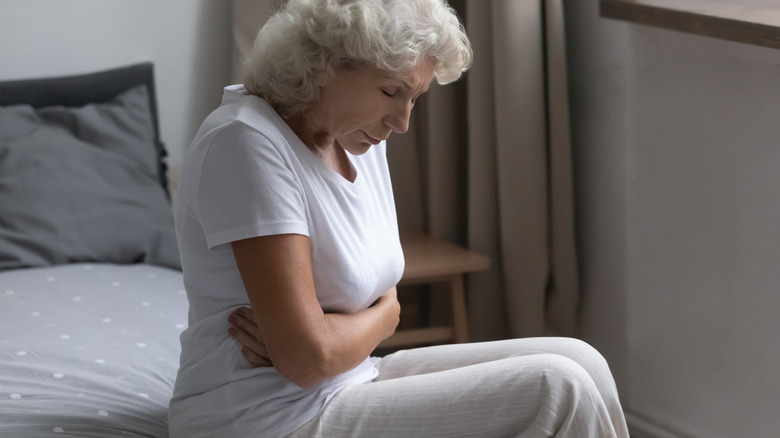 older woman with stomachache