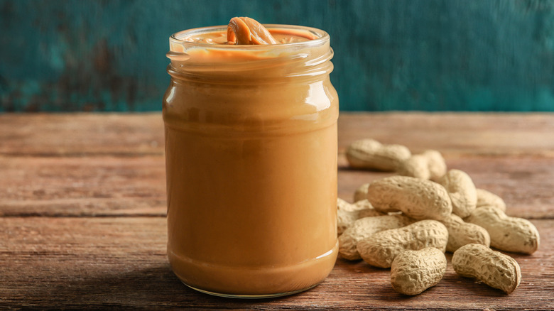 generic peanut butter in glass jar