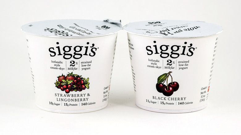 two white yogurt containers