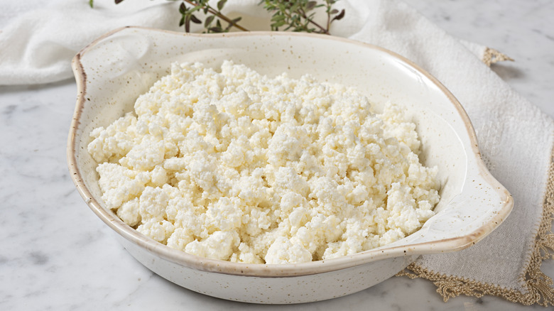 Ricotta cheese in ceramic bowl