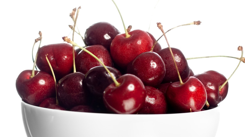 bowl of cherries on white background