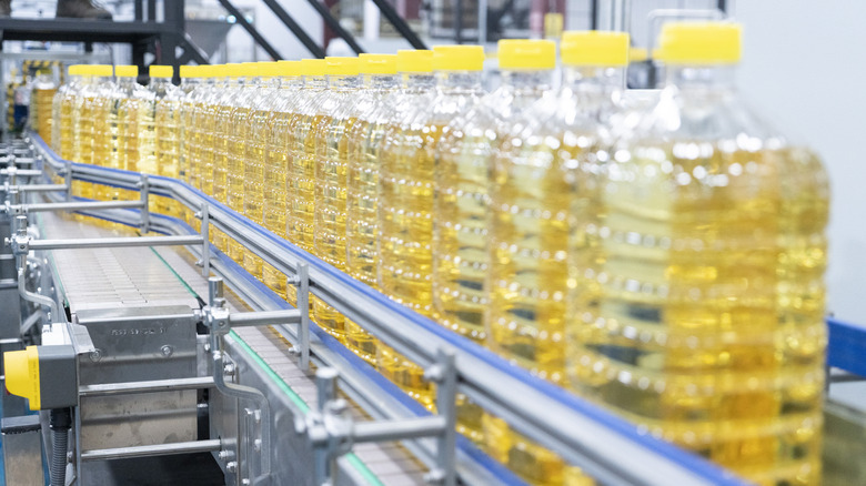 Bottles of vegetable oil on a factory line