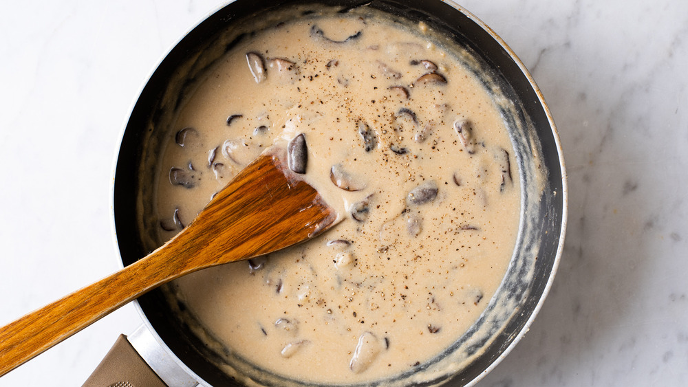 Creamy mushroom sauce in a skillet