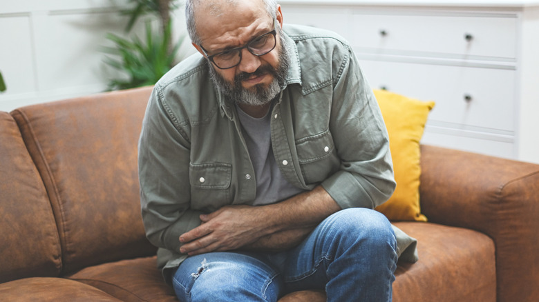 Man experiencing poop troubles