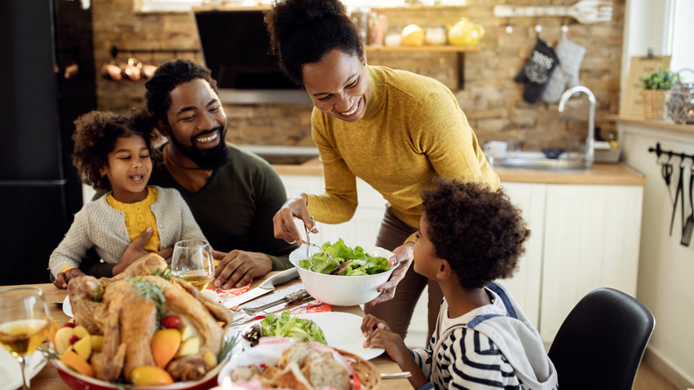 Family at table with food