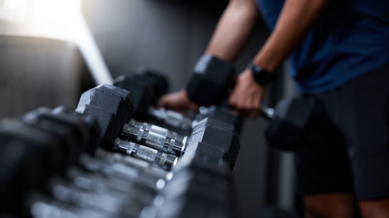 dumbells on a rack