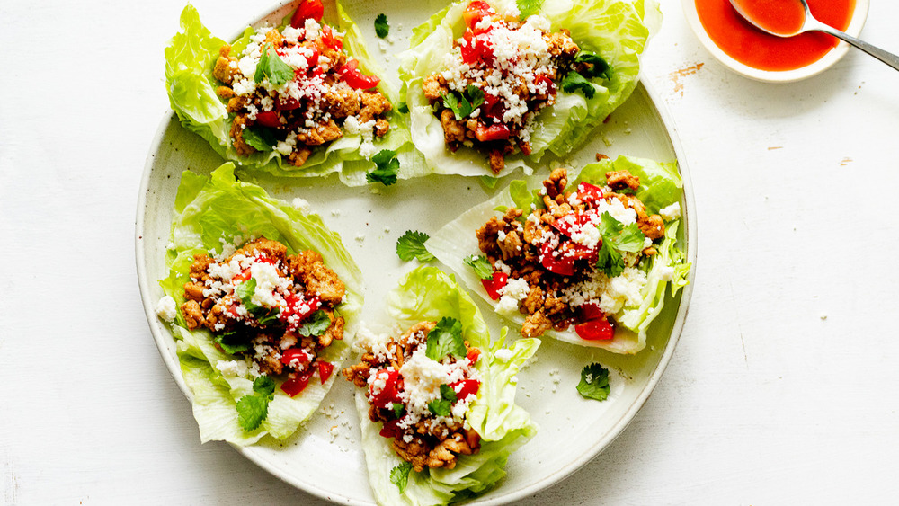 lettuce tacos being assembled