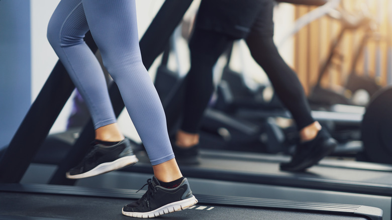 Legs walking on treadmill