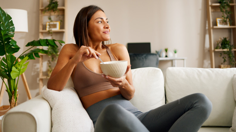 Older man eating oatmeal for breakfast