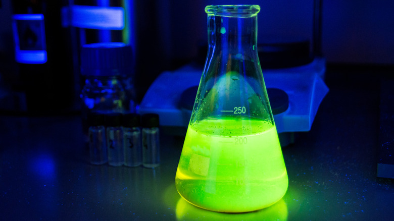 beaker of glowing liquid