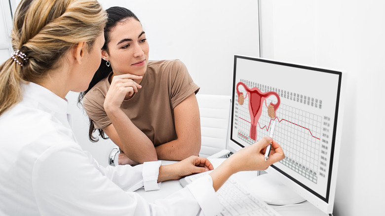 woman speaking with gynecologist