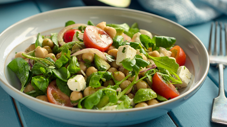 watercress salad with feta, chickpeas, and tomato