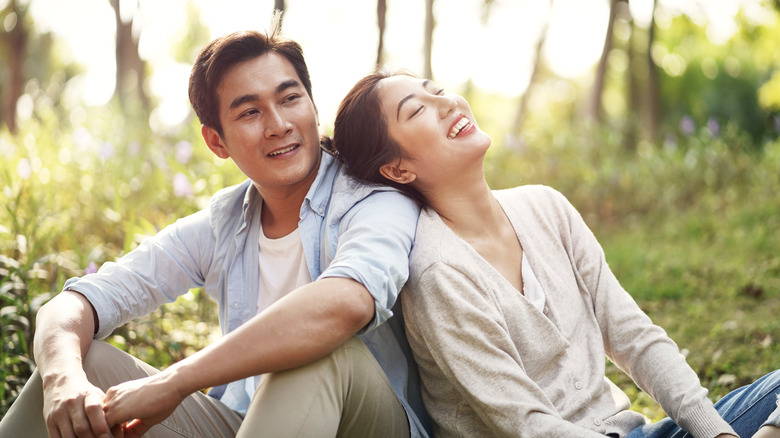 Smiling couple enjoying sunshine