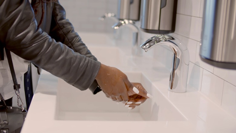 Person washing hands